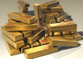 Prețul aurului a depășit pentru prima dată valoarea maximă atinsă în 2011