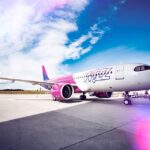 Scandal într-un avion Wizz Air care a aterizat pe Otopeni: Un pasager beat a fost luat pe sus de Poliţie