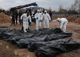 Zeci de civili ucraineni au fost găsiţi într-o groapă comună în Buzova