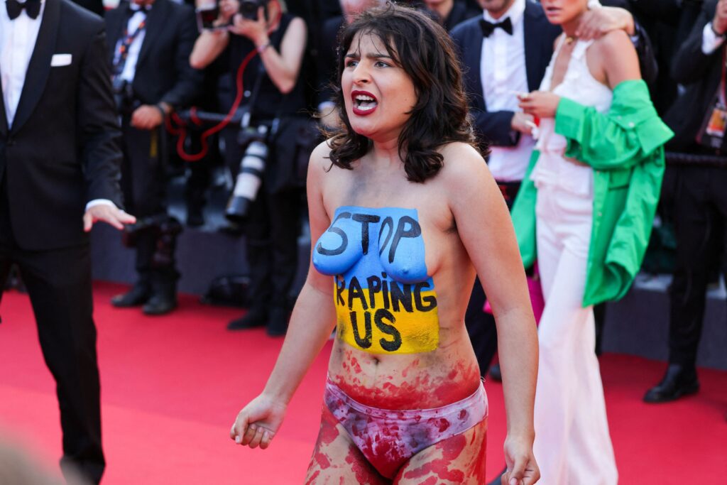 Cannes 2022 protest nud topless