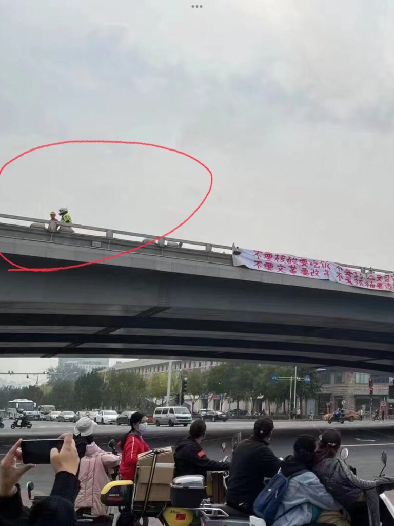 banner-protest-China-arest
