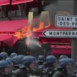 Proteste violente în Franța: Manifestanții au dat foc la restaurantul preferat al lui Macron. Peste 100 de arestări, 154 de polițiști și jandarmi răniți (Video)