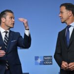 Trump câștigă pe două fronturi: NATO plătește, America încasează