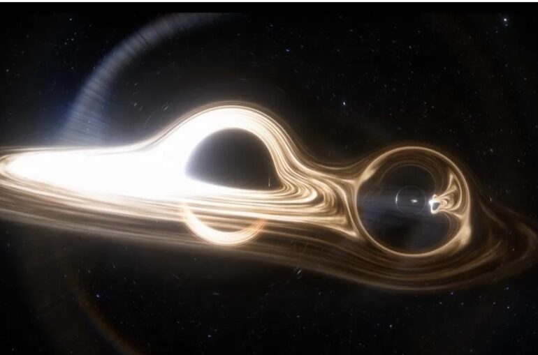 Premieră: Astronomii au fotografiat două găuri negre care se orbitează reciproc