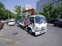 Primăria Capitalei vrea să ridice, pe zi, câte 30 de mașini parcate aiurea, în centrul Bucureștiului. Cine se va ocupa