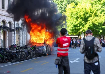 Protest violent la Geneva înainte de G7. Manifestanții au spart ferestre și au incendiat o Tesla (Video)