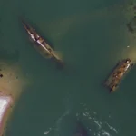 Scăderea nivelului Dunării a scos la suprafață epave naziste. Nemții și-au scufundat singuri vreo 200 (Foto & Video)