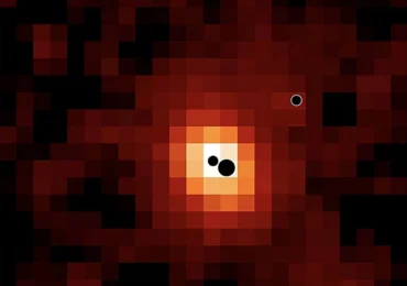 Astronomii au găsit 3 găuri negre supermasive pe punctul de a se ciocni