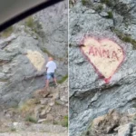 Căutat de poliție pentru vandalism pe Transfăgărășan: Ce riscă bărbatul care a desenat pe o stâncă mesajul de iubire pentru „Anna”