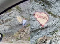 Căutat de poliție pentru vandalism pe Transfăgărășan: Ce riscă bărbatul care a desenat pe o stâncă mesajul de iubire pentru „Anna”