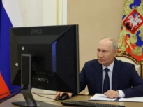 Alegeri parlamentare în Rusia. Imagini virale cu Putin care a votat online. A folosit o versiune Windows fără licență